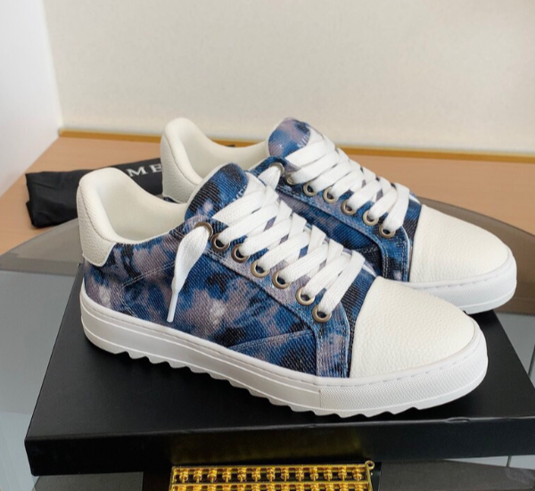 NUMERIS blue patterned white-toe low-top sneakers