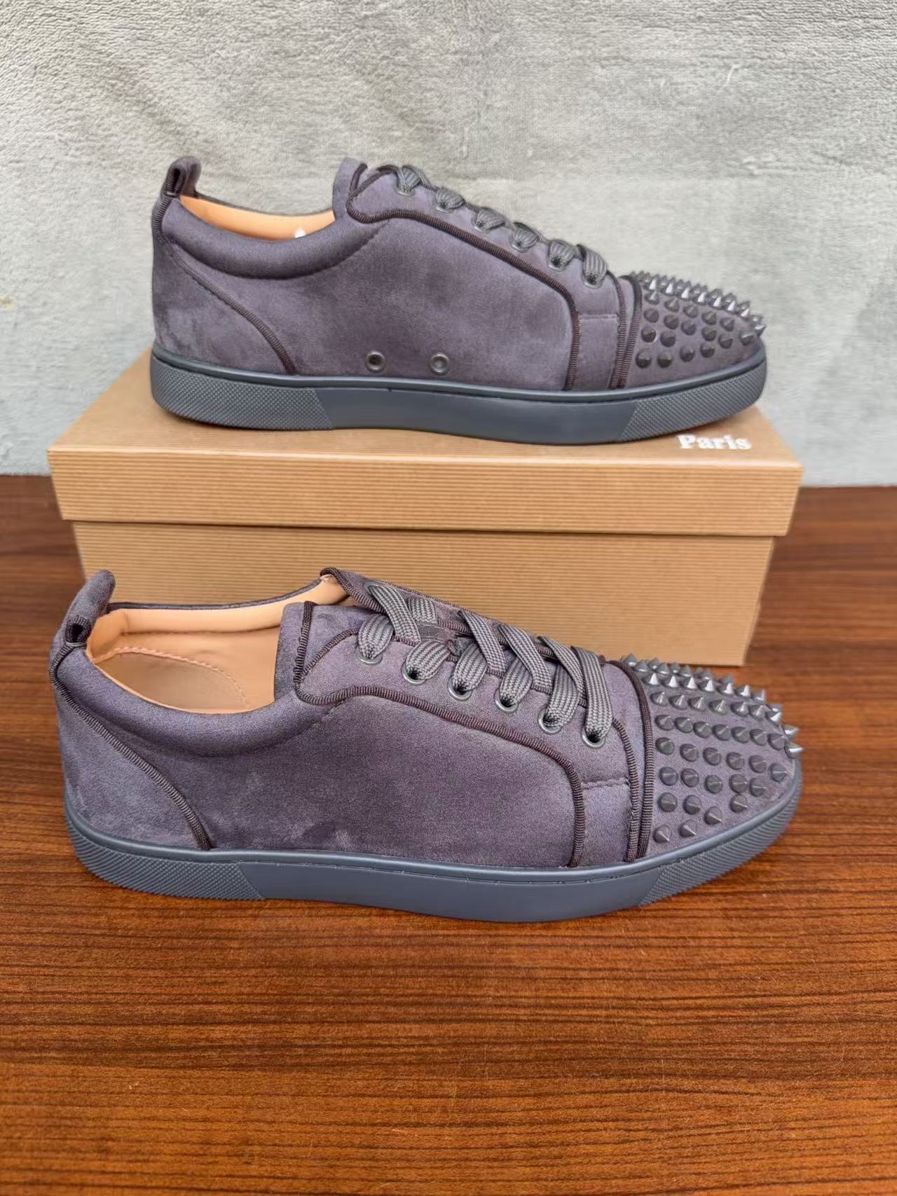 Christian Louboutin gray suede spiked low-top sneakers